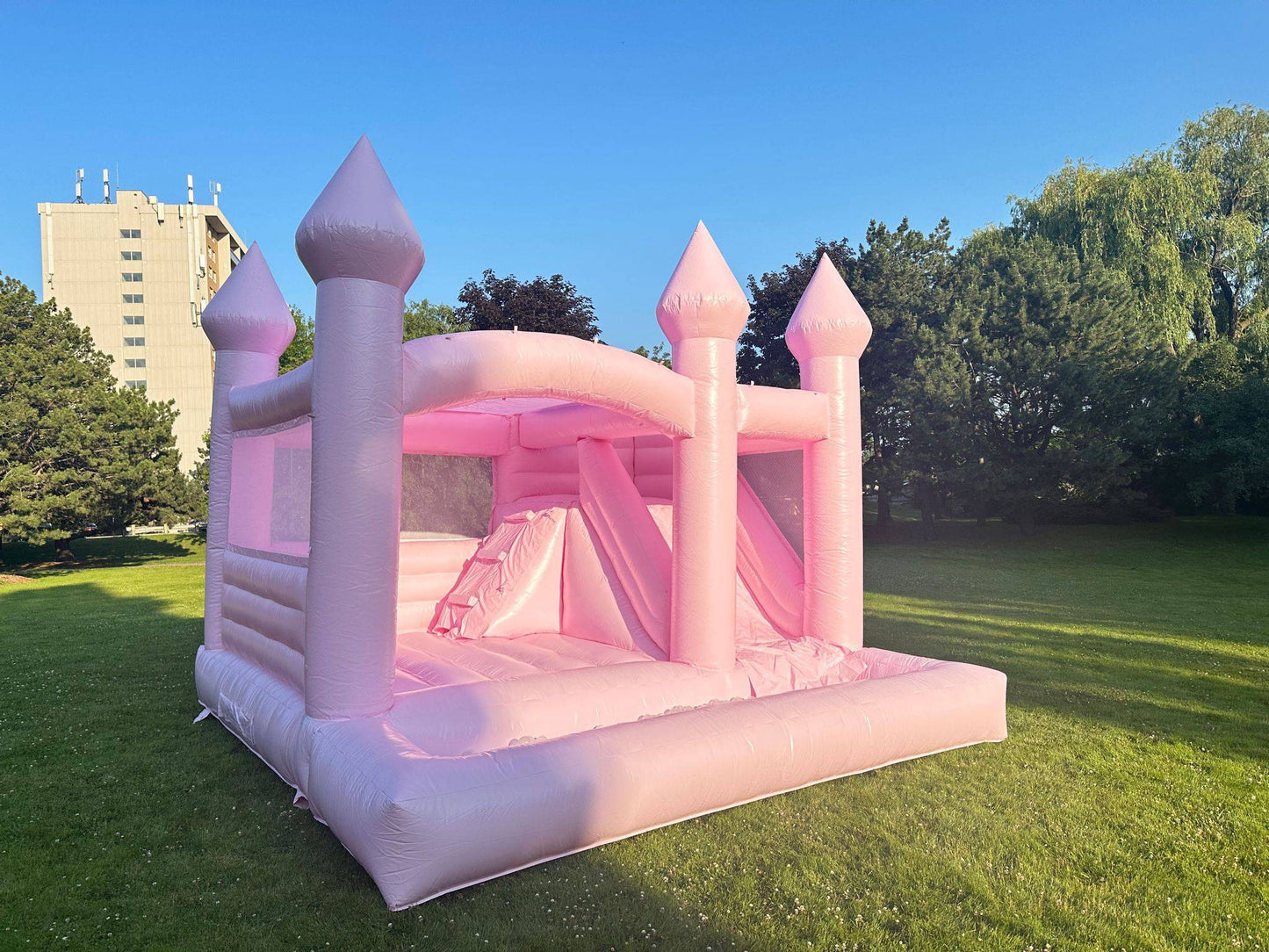 Large pink castle toy by My Store with turrets, flags, and detailed walls for imaginative play.