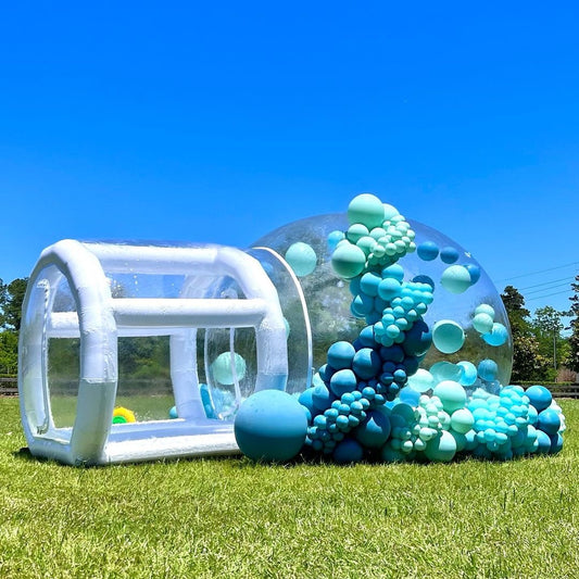 Clear bubble house by Aura Luxury Rental Ltd with transparent walls and modern design, set in a scenic outdoor environment.